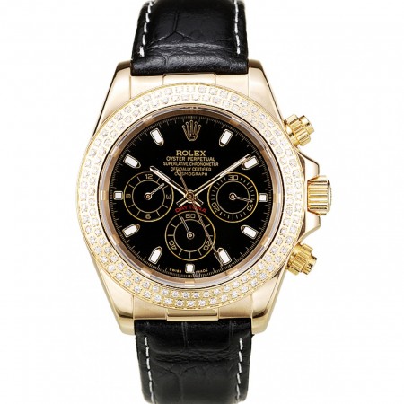 Rolex Daytona cassa in oro con quadrante nero lunetta con borchie in cristallo