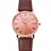 Patek Philippe Calatrava quadrante in oro rosa con numeri romani lunetta a coste cassa in oro rosa cinturino in pelle marrone