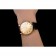 Patek Philippe Calatrava quadrante oro numeri romani lunetta a coste cassa in oro cinturino in pelle nera